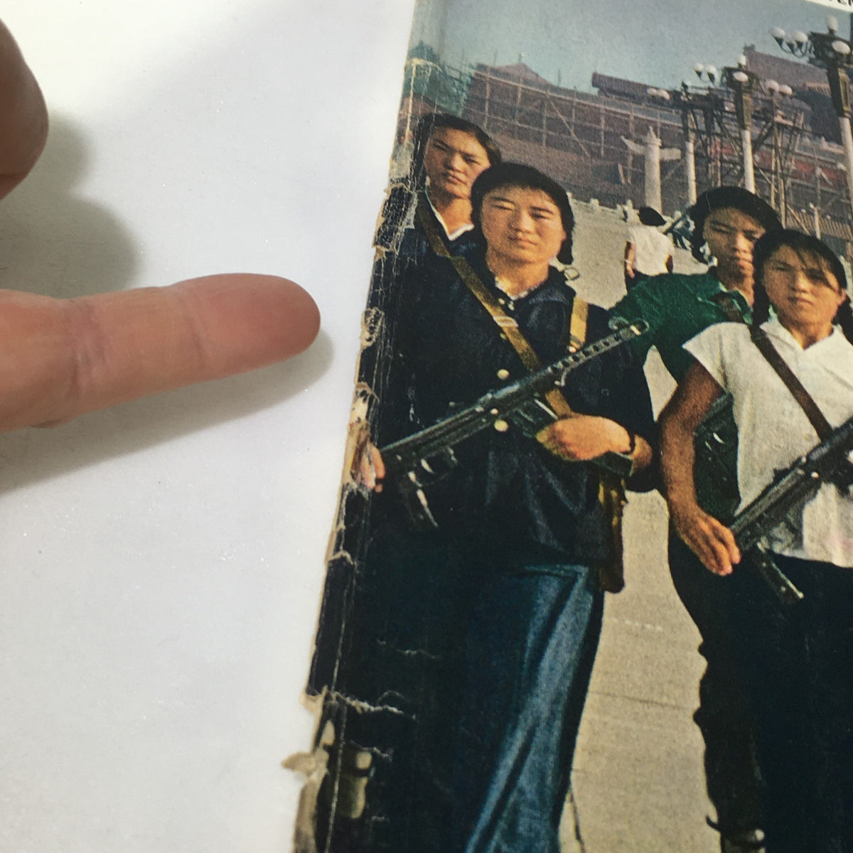 Close-up view of the cover of VTG The Saturday Evening Post November 14 1964 - Girl Scout Chinese Version highlighting details of the group with rifles.