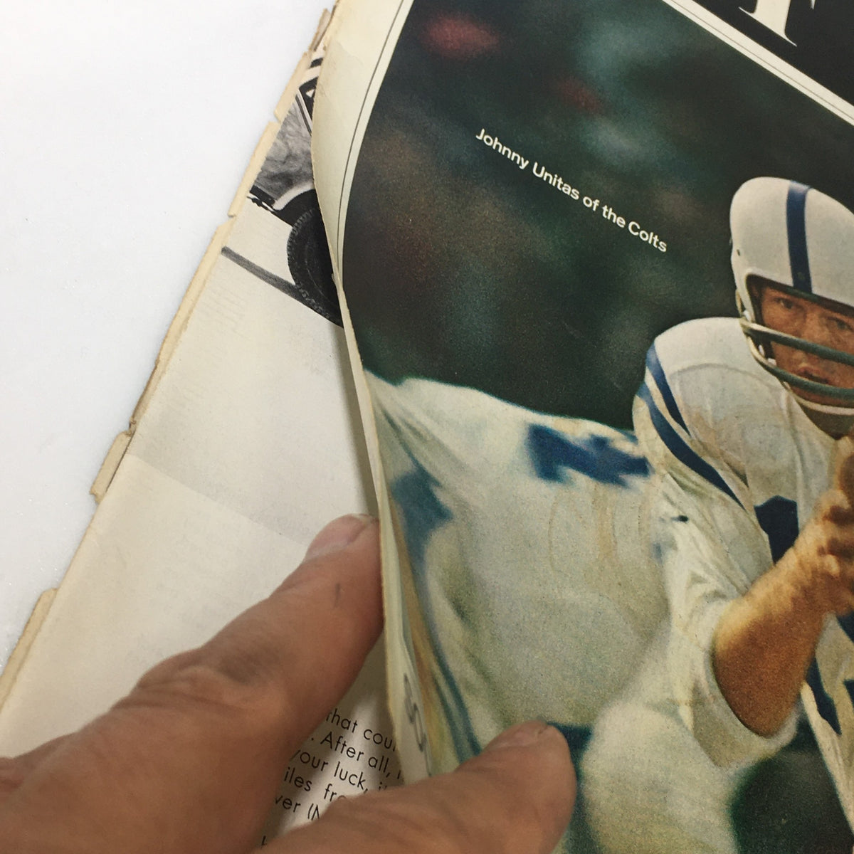 Close-up of Johnny Unitas in action from The Saturday Evening Post, December 12, 1964, showcasing his role as a legendary quarterback.