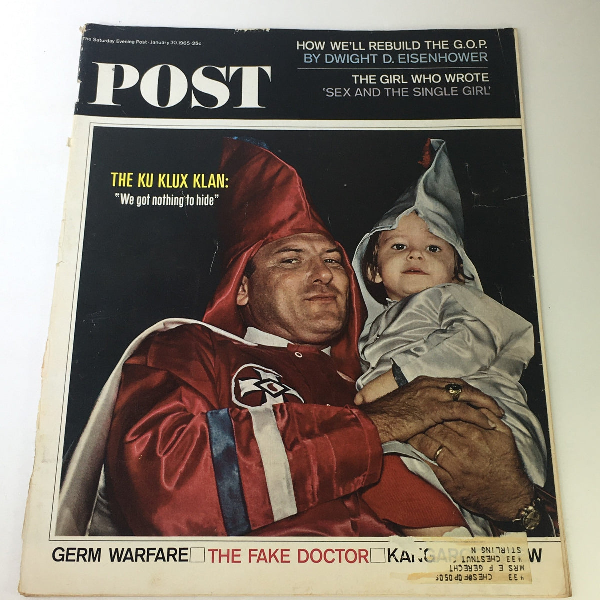 Cover of the January 30, 1965 issue of The Saturday Evening Post featuring the headline 'The Ku Klux Klan: We Got Nothing to Hide' with a man in a Klan hood holding a child.