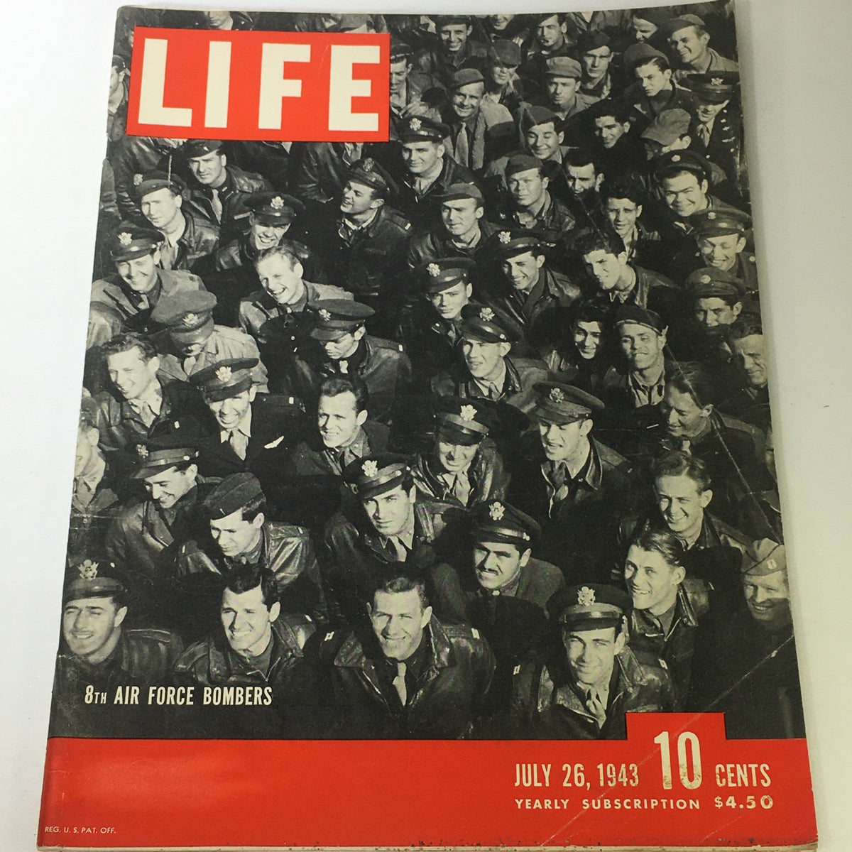 Front cover of VTG Life Magazine dated July 26, 1943, featuring the 8th Air Force Bombers with a striking photograph of airmen in military attire. The cover highlights wartime journalism and historical significance.