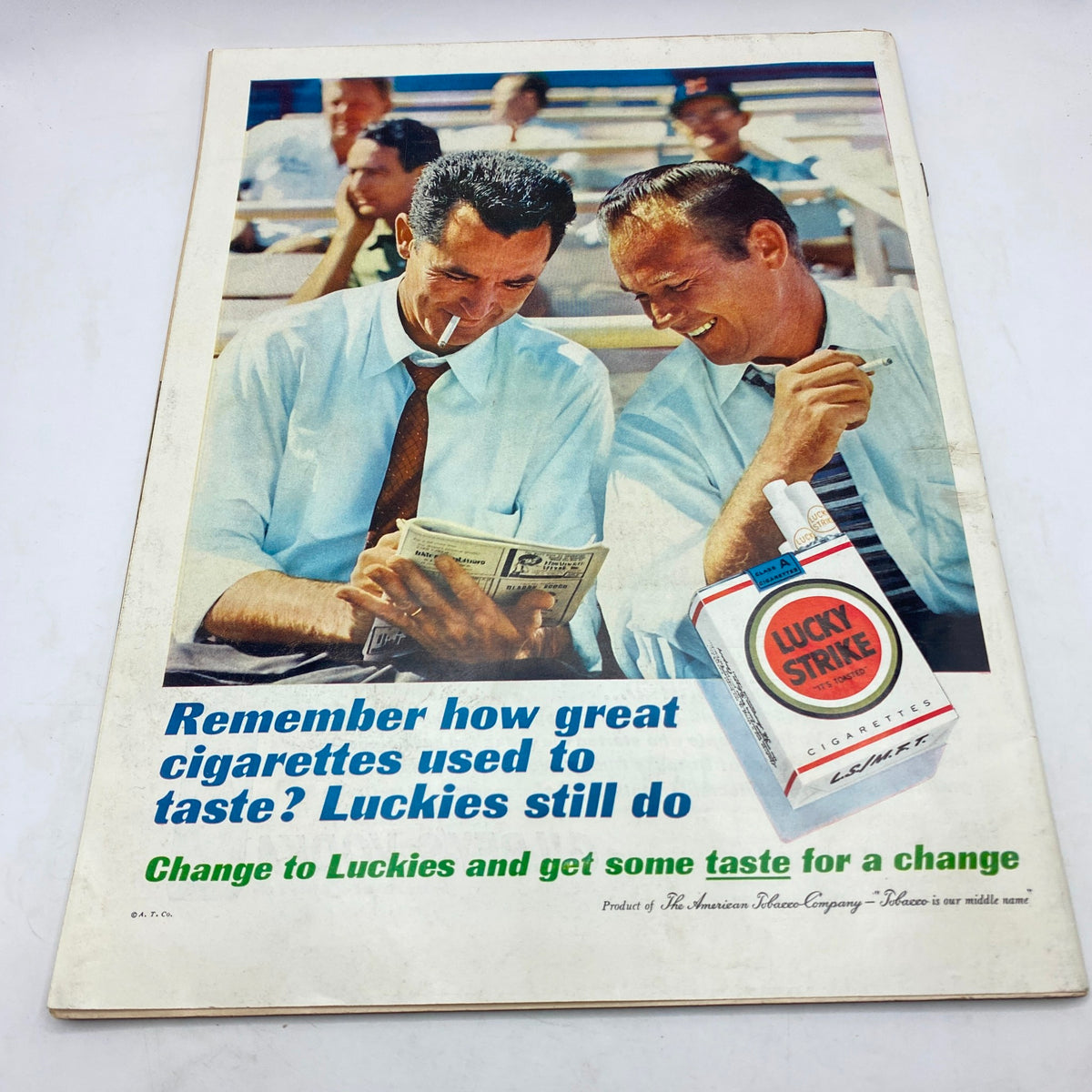 Advertisement page from Vintage Life Magazine August 18, 1961 highlighting Lucky Strike cigarettes with two men enjoying a baseball game.