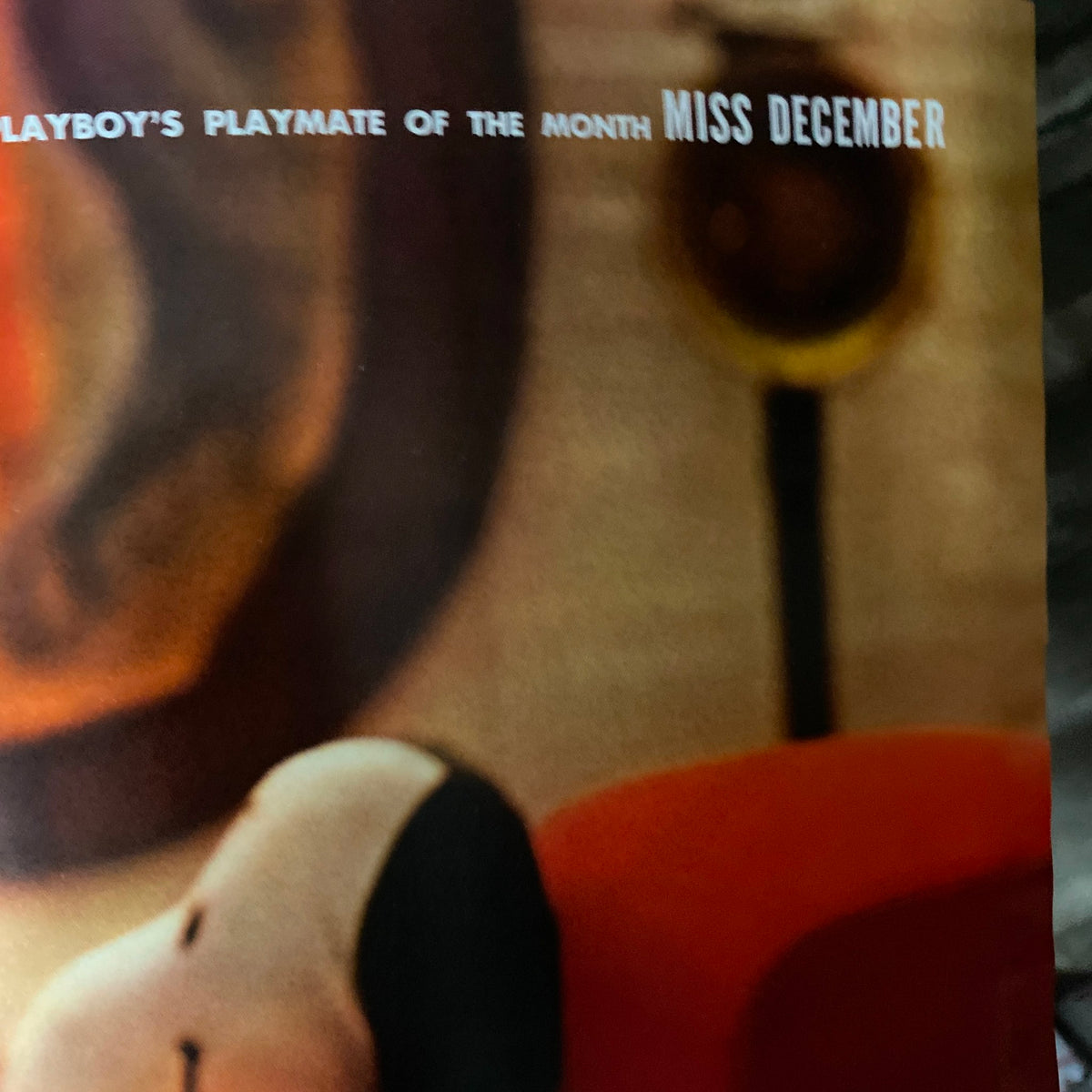 VTG Playboy Magazine December 1969 highlighting the Playmate of the Month, Miss December, featuring a stylish typography on the page.
