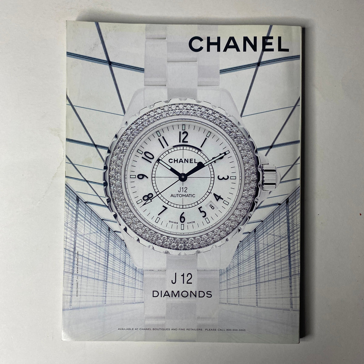 Chanel J12 Diamonds brochure featuring a luxurious diamond-studded watch, highlighting the elegance and sophistication of Chanel's watch collection.