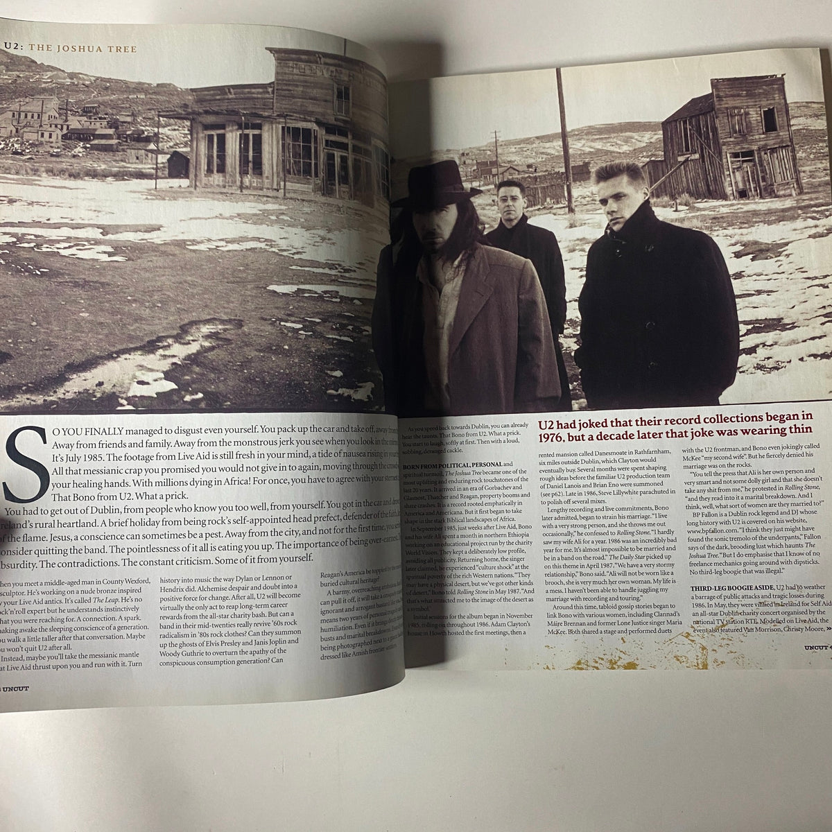 Continuing coverage in Uncut Magazine October 2003, discussing U2's The Joshua Tree, reflecting on the band’s journey in music and Americana themes.