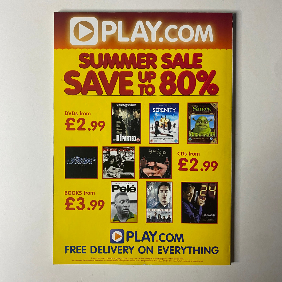 Advert for Play.com featured in Uncut Magazine August 2007, promoting summer sale on DVDs, CDs, and books. Relevant to the magazine's content.
