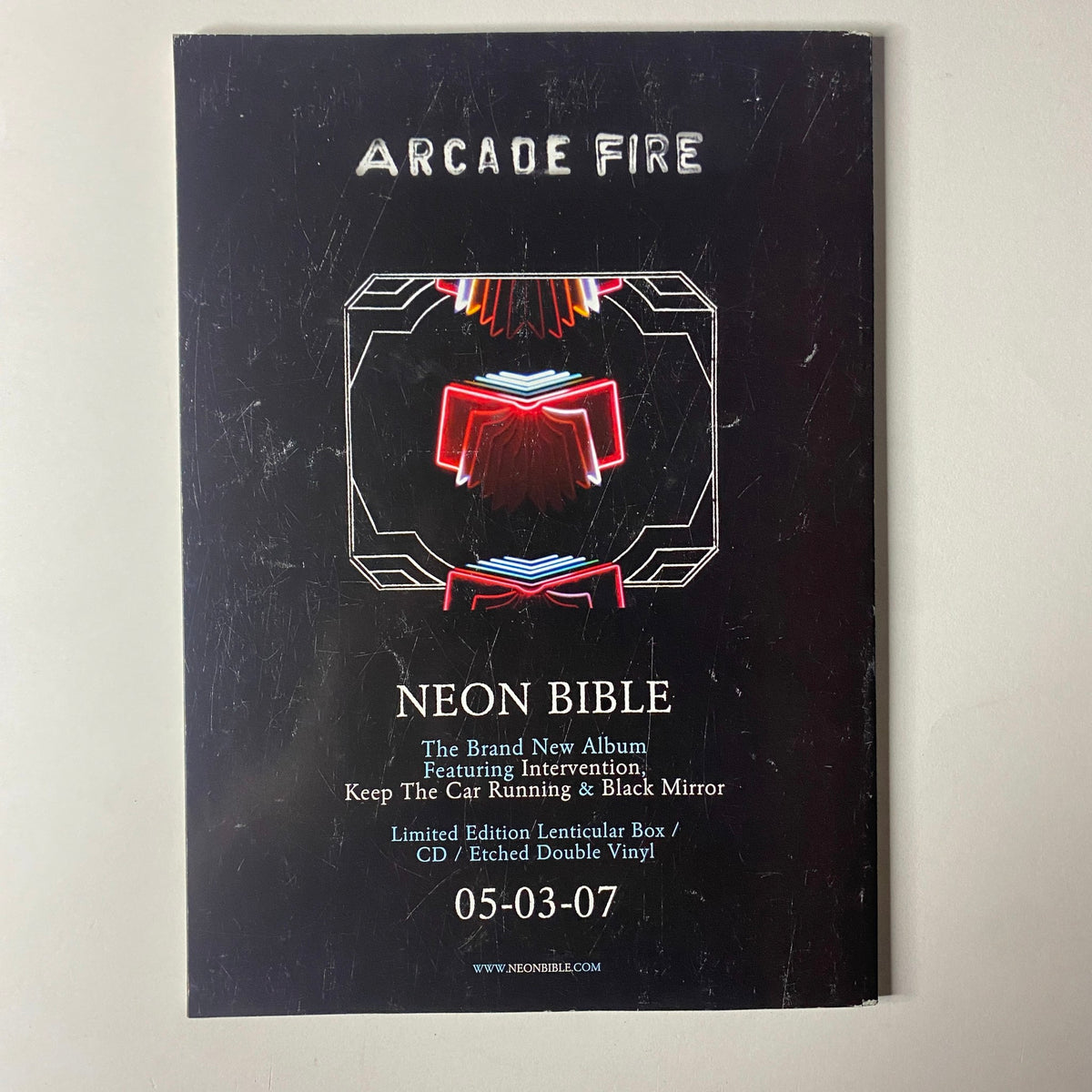 Promotional back cover of Uncut UK Magazine April 2007 advertising Arcade Fire's album 'Neon Bible,' featuring details about the limited edition release.