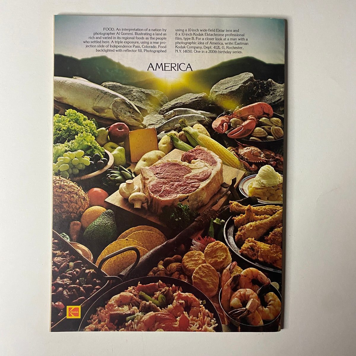 Colorful food advertisement representing American cuisine in Industrial Photography Magazine July 1976, highlighting a variety of dishes arranged artistically with food items on a scenic background.