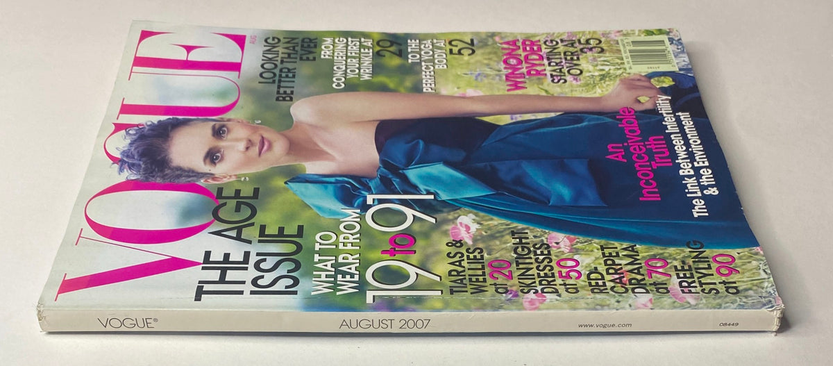 Side view of Vogue Magazine August 2007 with Winona Ryder on the cover, highlighting the magazine's title and visually engaging color scheme, emphasizing its role in fashion commentary.