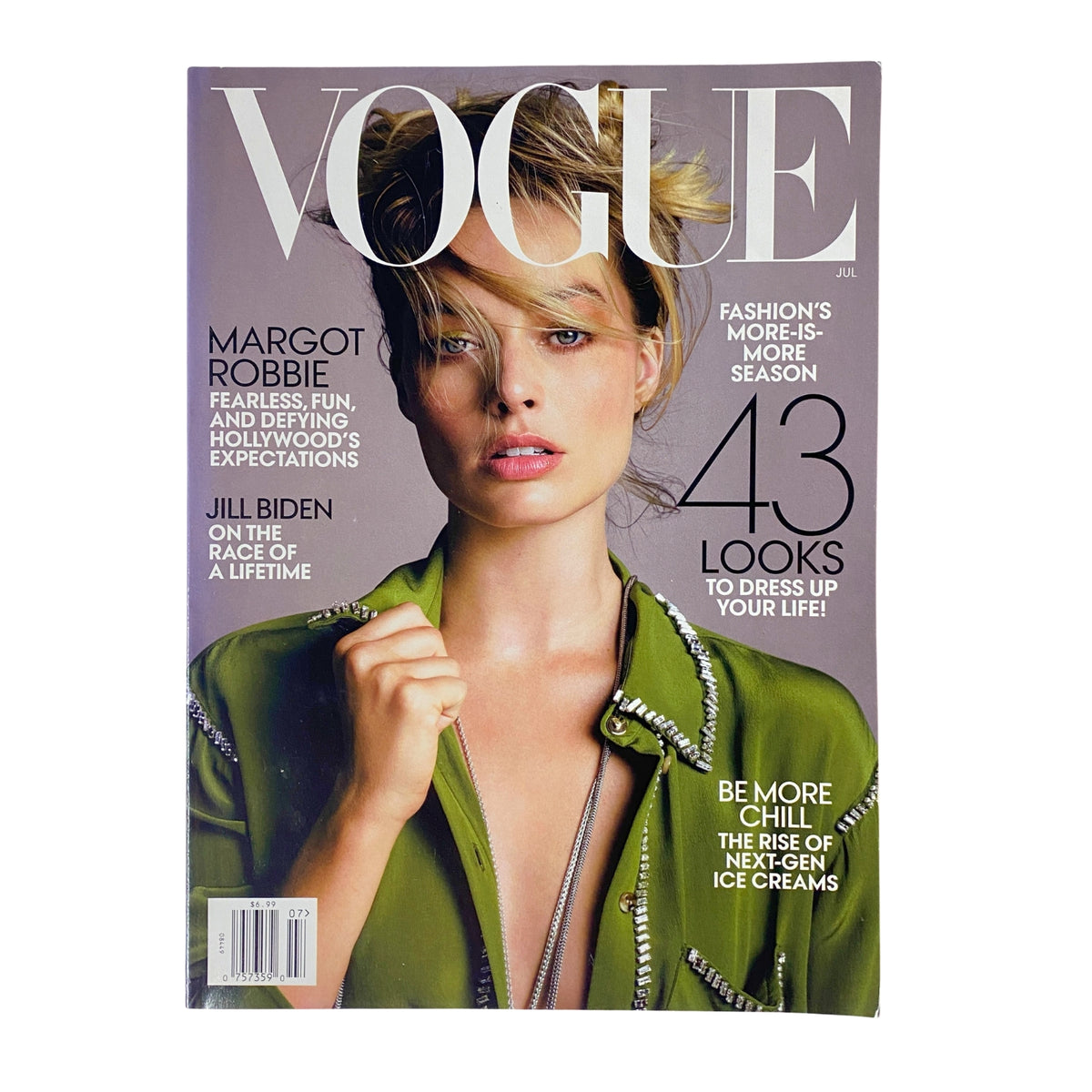 Cover of Vogue Magazine July 2019 featuring Margot Robbie. The cover highlights her confident look with the headline 'Margot Robbie: Fearless, Fun, and Defying Hollywood’s Expectations' and includes features on fashion and lifestyle.