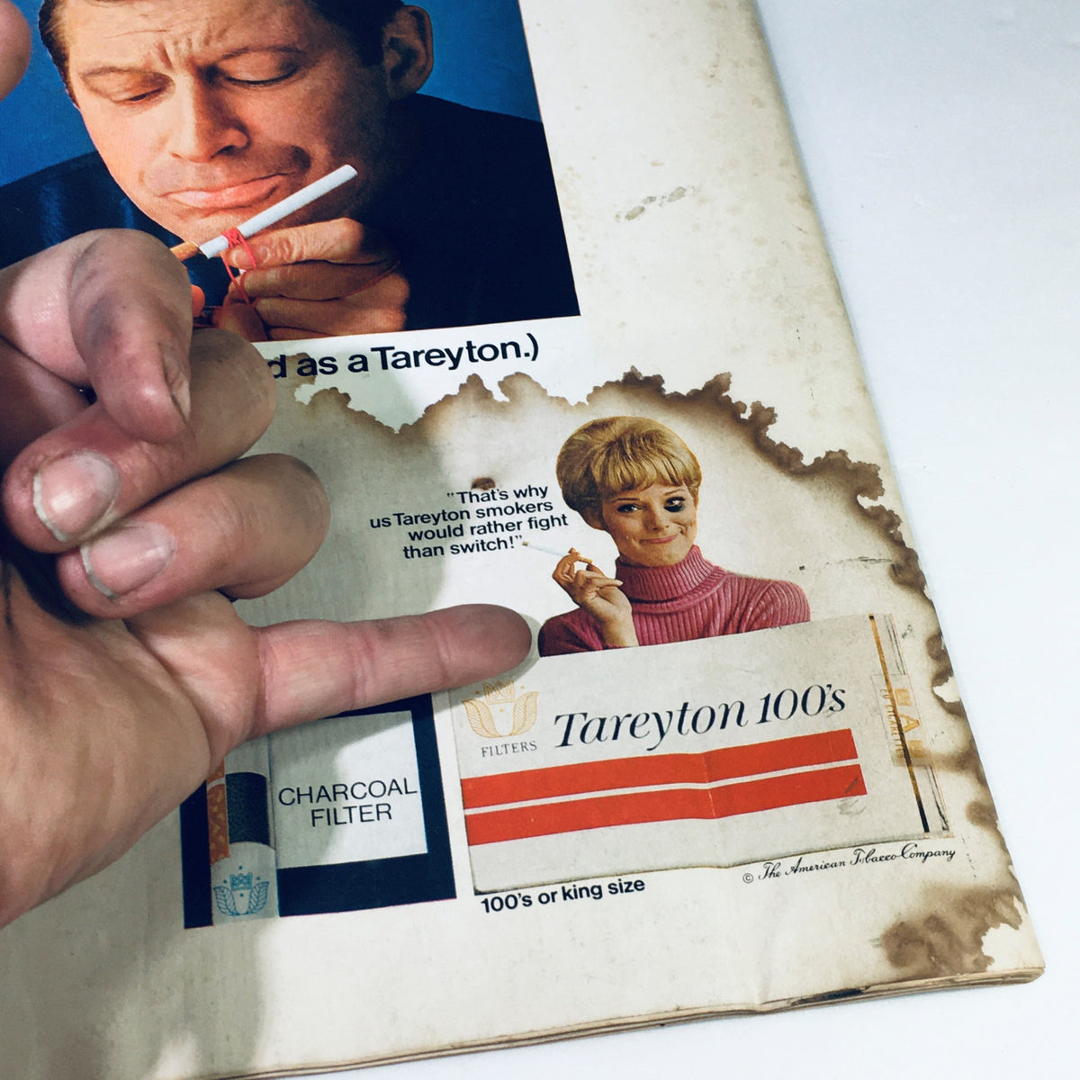 Vintage advertisement from Life Magazine March 1, 1968 featuring Tareyton cigarettes, showcasing a woman with a playful expression and a man handling a cigarette. This image illustrates the cultural context of smoking in the 1960s, complementing the cover story on Georgia O'Keeffe in New Mexico.
