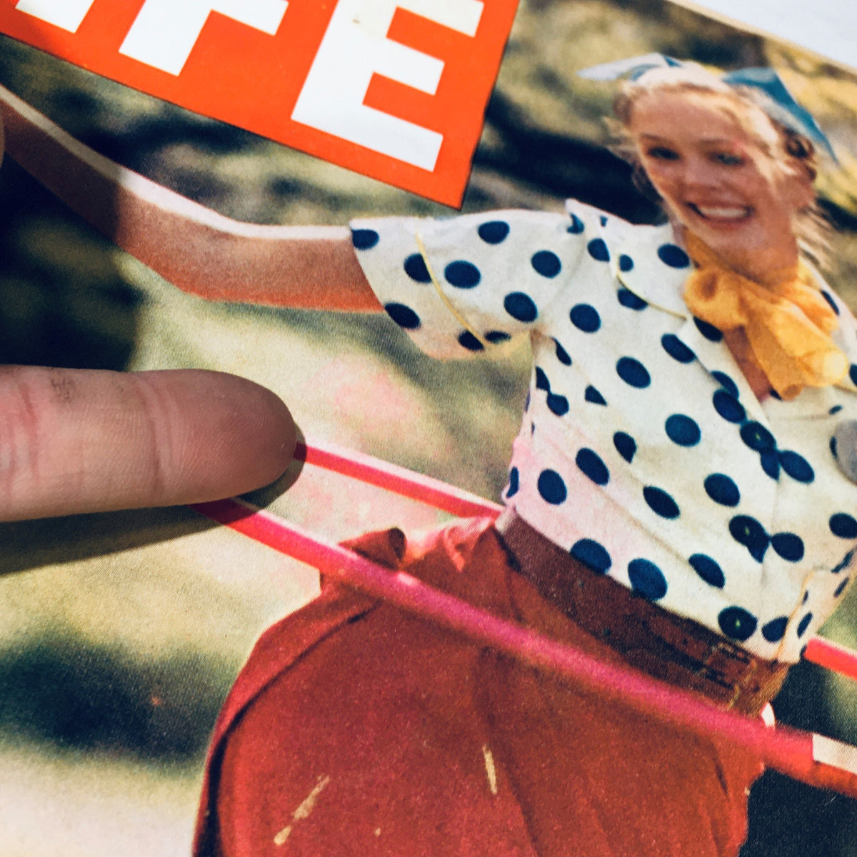 Close-up of the cover of the June 16, 1972, Life Magazine highlighting a woman in a polka dot outfit, focusing on the nostalgic elements of the 50s, including a hula hoop and vintage style.
