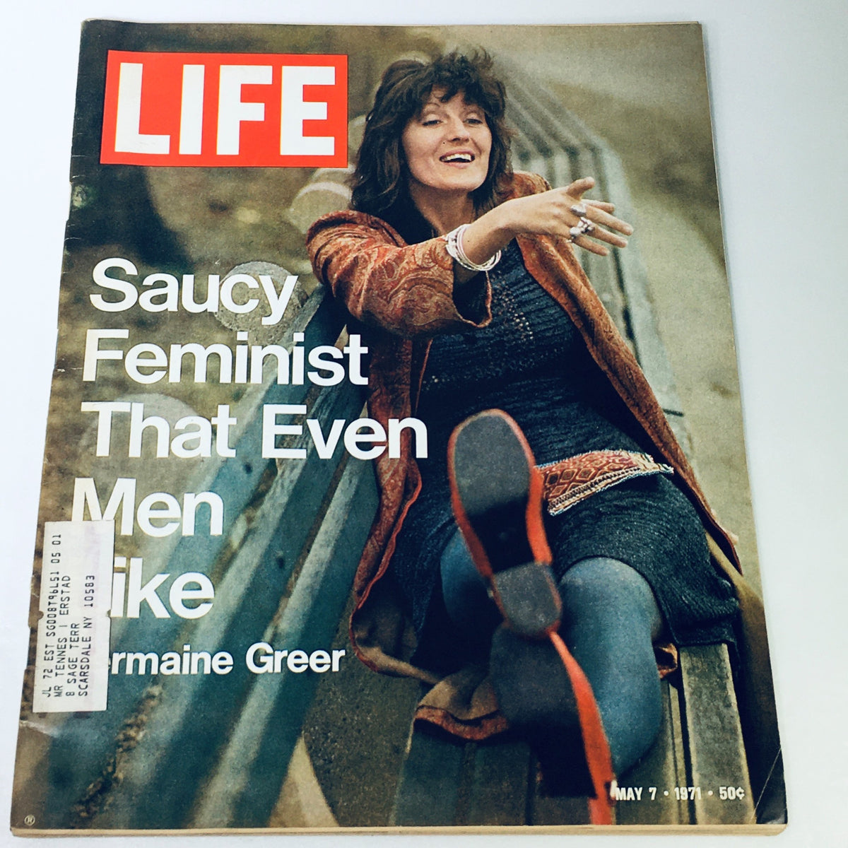 Vintage Life Magazine cover from May 7, 1971, featuring the title 'Saucy Feminist That Even Men Like Germaine Greer'. The cover displays a woman smiling and reclining on a bench, showcasing the cultural relevance of Germaine Greer in the feminist movement during the early 1970s.