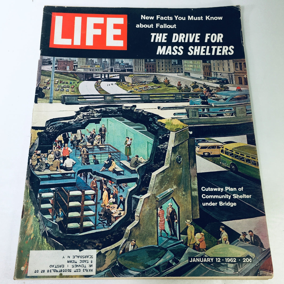 Cover of VTG Life Magazine January 12 1962 titled 'The Drive for Mass Shelters' featuring a cutaway illustration of a community shelter and urban scene, highlighting social issues of the 1960s.