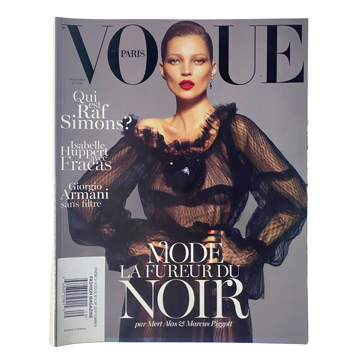 Vogue Paris Magazine September 2012 No. 930 featuring Kate Moss on the cover, showcasing a powerful autumn fashion statement with the theme 'Mode La Fureur du Noir.' The magazine is in very good condition with a stylish design.