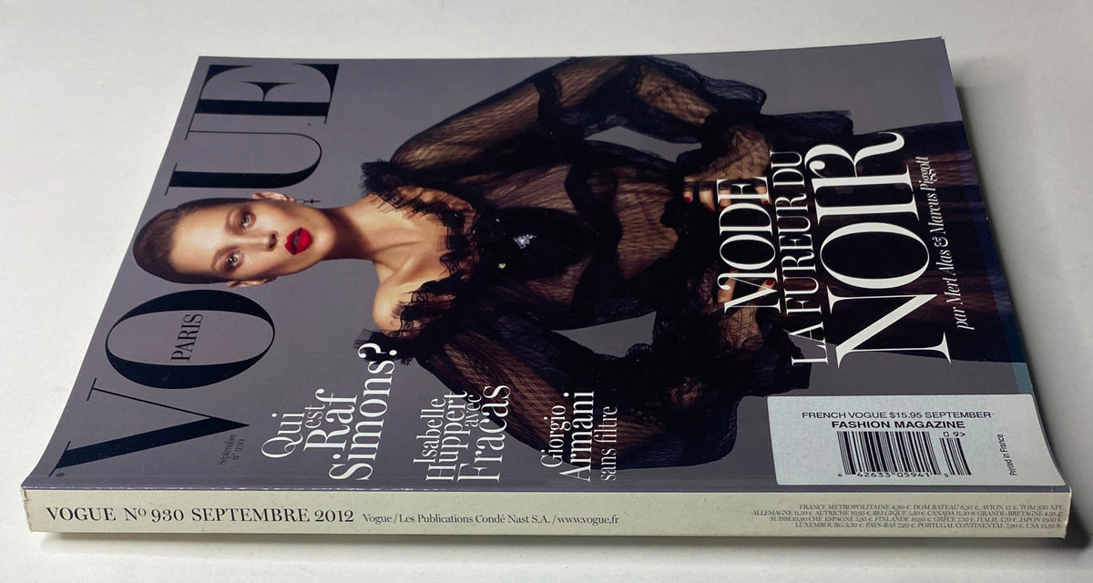 Vogue Paris Magazine September 2012 No. 930 with Kate Moss on the cover, highlighting an elegant black fashion ensemble. The magazine emphasizes cultural depth and timeless fashion storytelling.