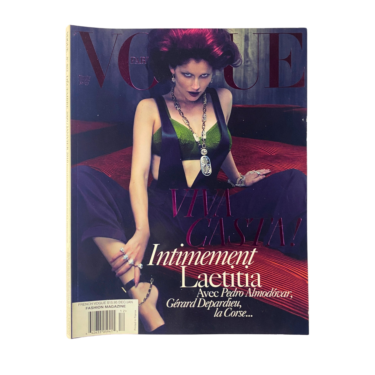 Vogue Paris Magazine December 2009 No. 903 Laetitia Casta Cover showcasing a glamorous winter look with bold text reading 'Viva Casta!'.