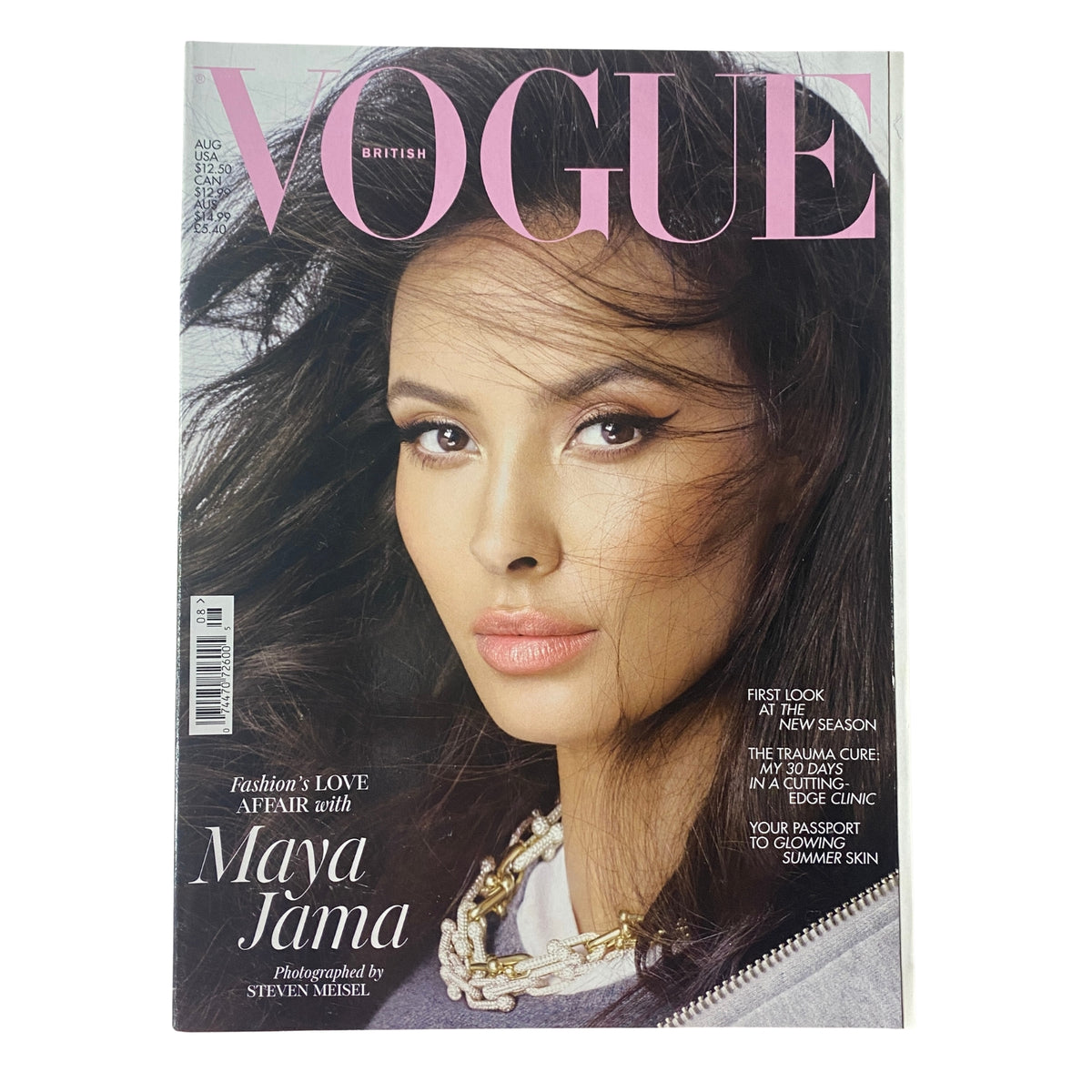 Cover of Vogue British Magazine August 2023 featuring Maya Jama, showcasing her striking beauty and elegant style. The title reads 'Vogue' prominently in pink letters, highlighting this issue's focus on fashion and cultural insights.
