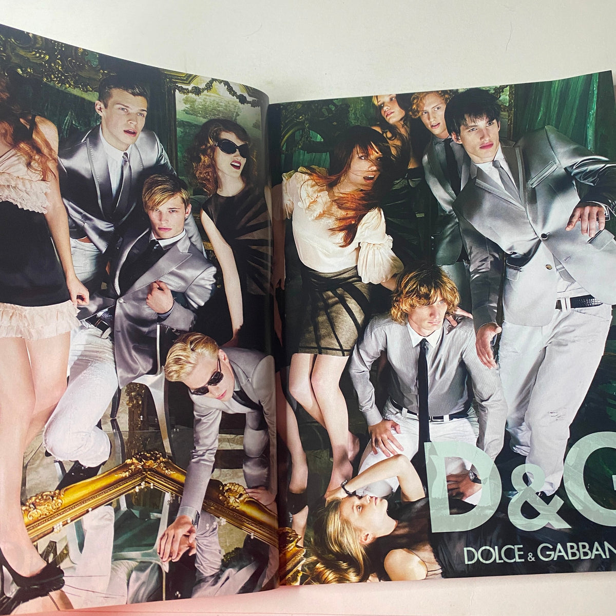 Vogue British Magazine June 2008 Agyness Deyn Cover features a fashion editorial with models styled in silver suits by Dolce & Gabbana, offering a glamorous representation of summer fashion.