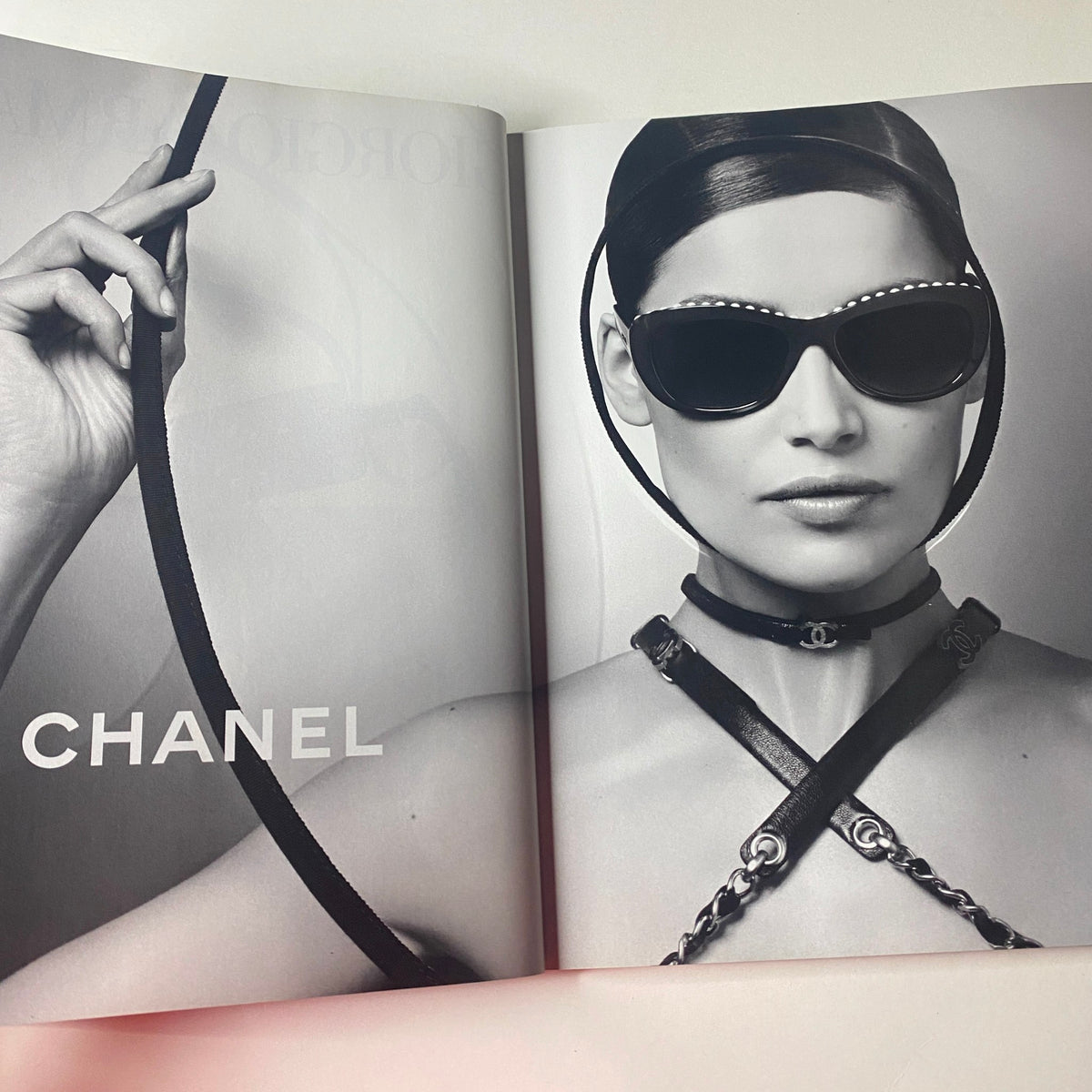 Open page from Vogue British Magazine June 2013 showcasing a Chanel eyewear advertisement featuring a model in chic sunglasses, aligning with the magazine's focus on high fashion.