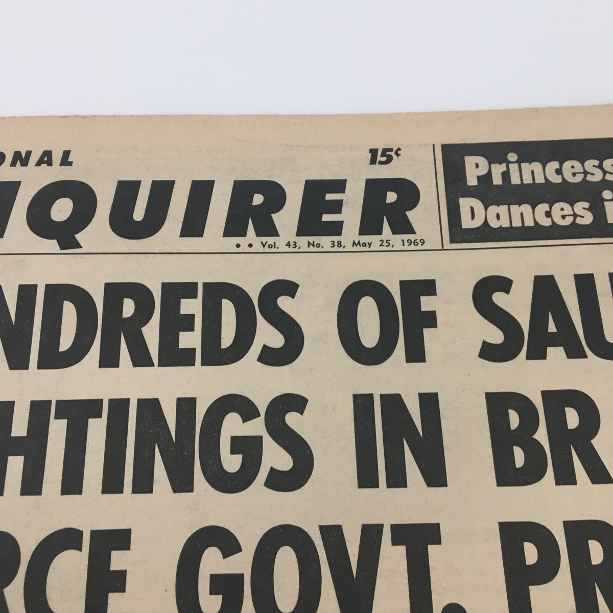 Close-up of the National Enquirer Newspaper May 25, 1969, displaying the publication date and prominent headlines.