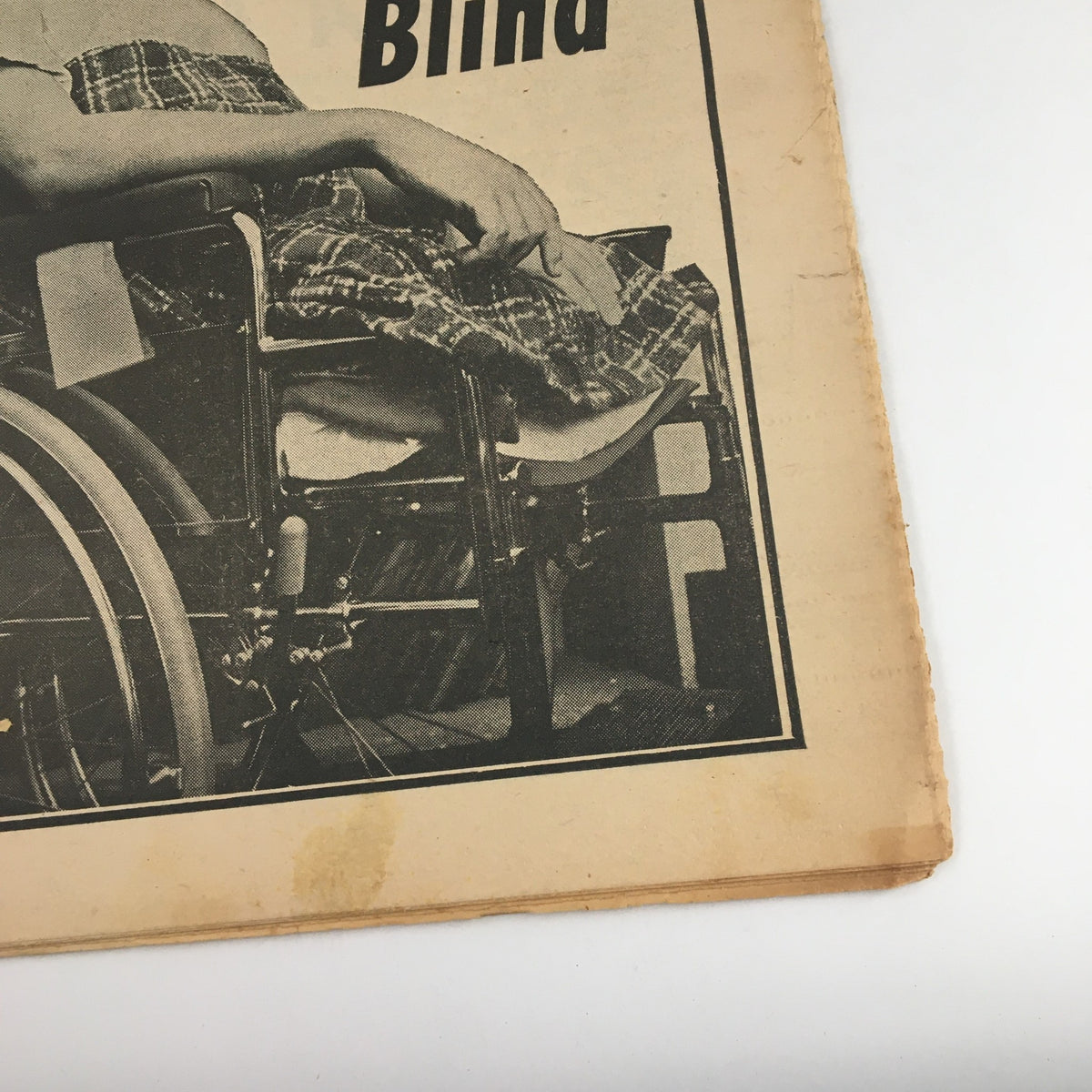 Detailed image from the National Enquirer October 21, 1962, showing a man in a wheelchair, part of the story on the challenges of living with a disability.