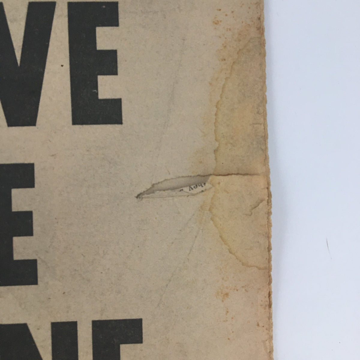 Detailed view of the National Enquirer Newspaper June 20 1965 showing a small tear on the cover with vintage condition highlighting its historical significance.