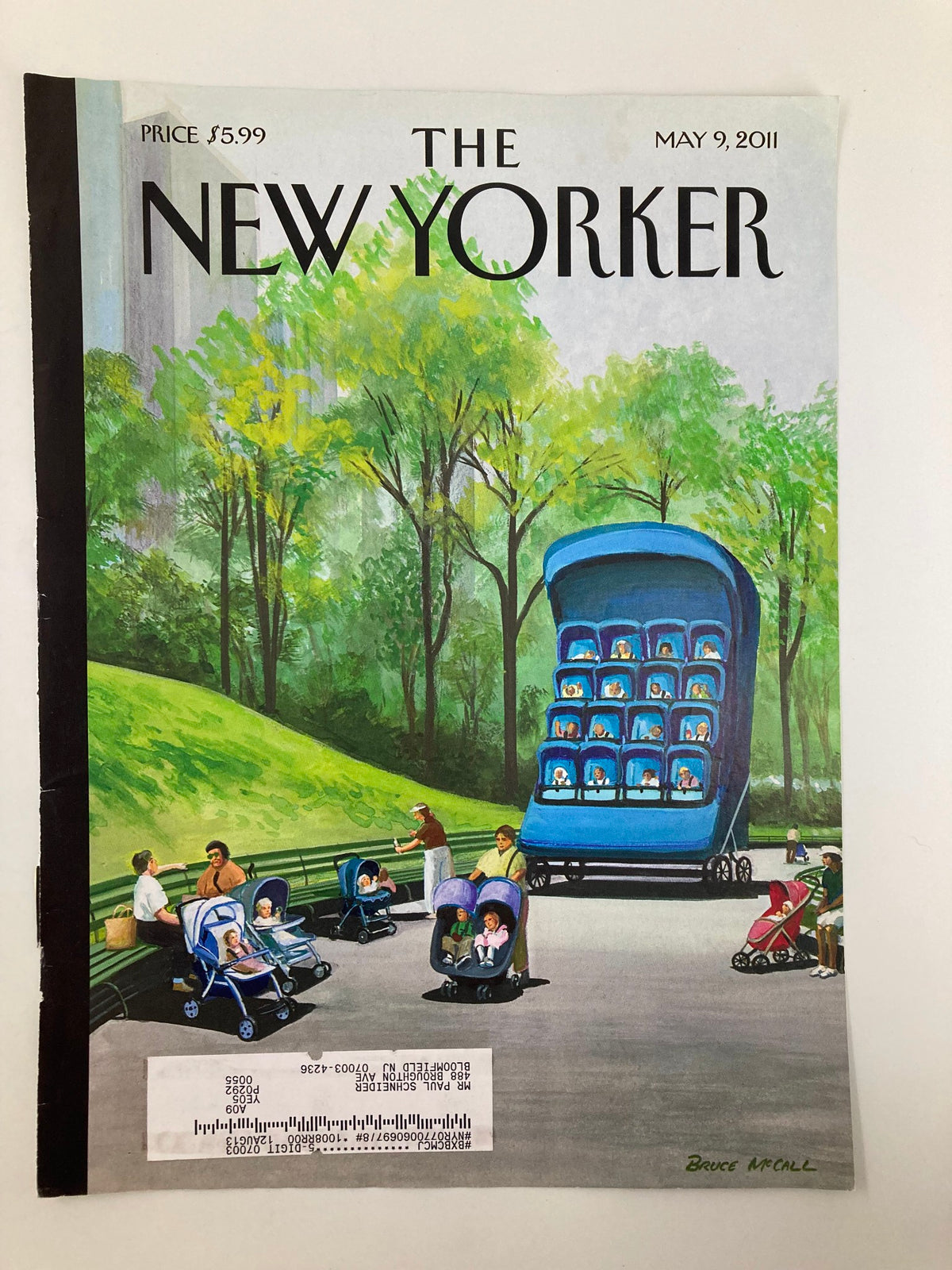Cover art of The New Yorker for May 9, 2011, showcasing 'Super Mother's Day' by Bruce McCall, featuring vibrant colors and a park setting with children and strollers.