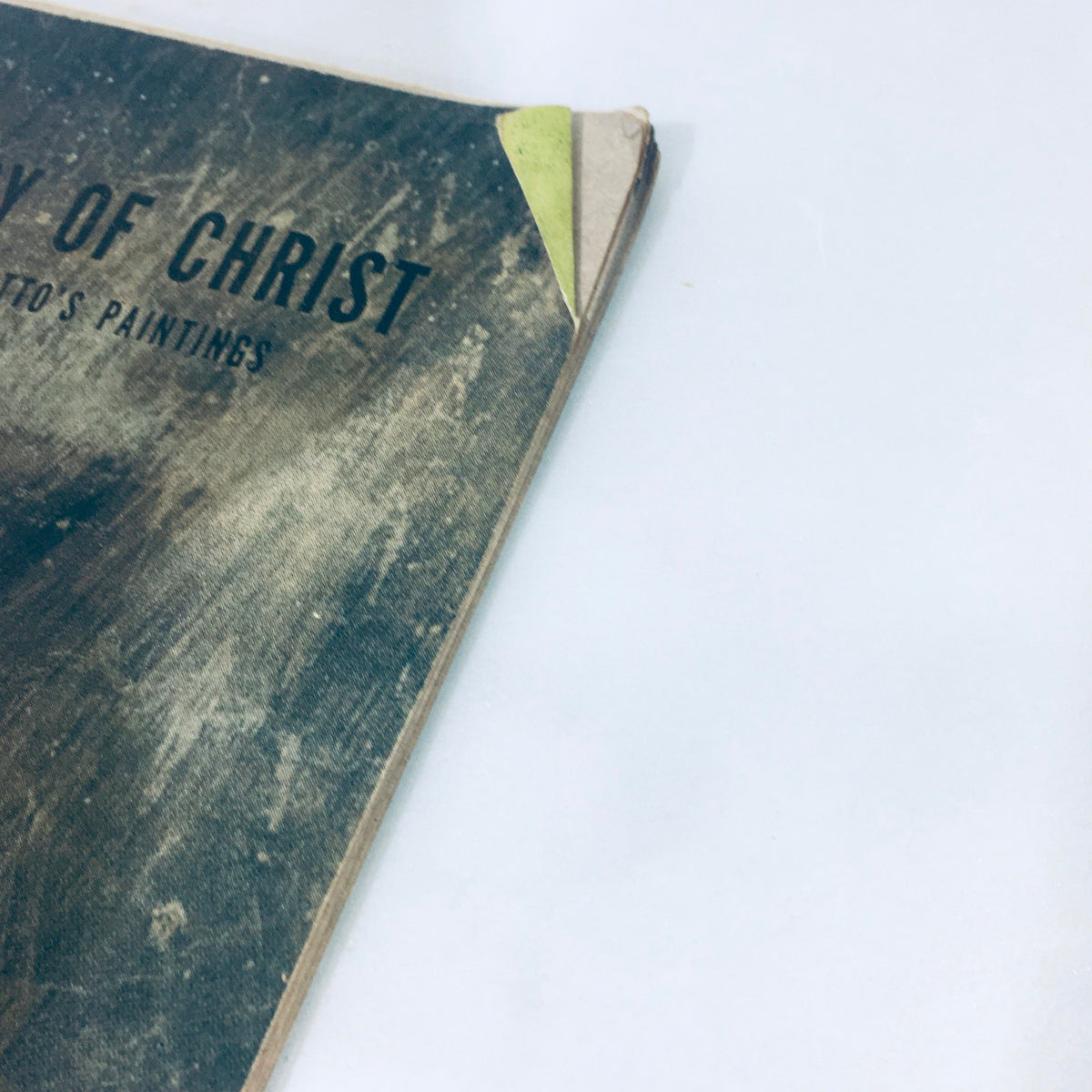 Corner view of the vintage Life Magazine December 27, 1948, showcasing the title 'The Story of Christ' alongside signs of wear, illustrating its collectible status in discussing Giotto's paintings.