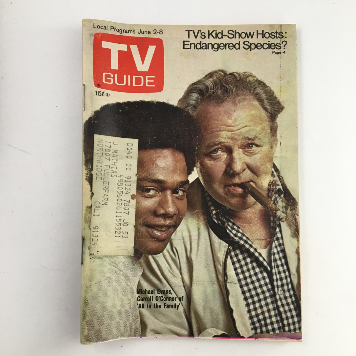 Cover of TV Guide Magazine June 2, 1973 featuring Michael Evans and Carroll O'Connor, showcasing a nostalgic moment in television history with the caption 'TV's Kid-Show Hosts: Endangered Species?'