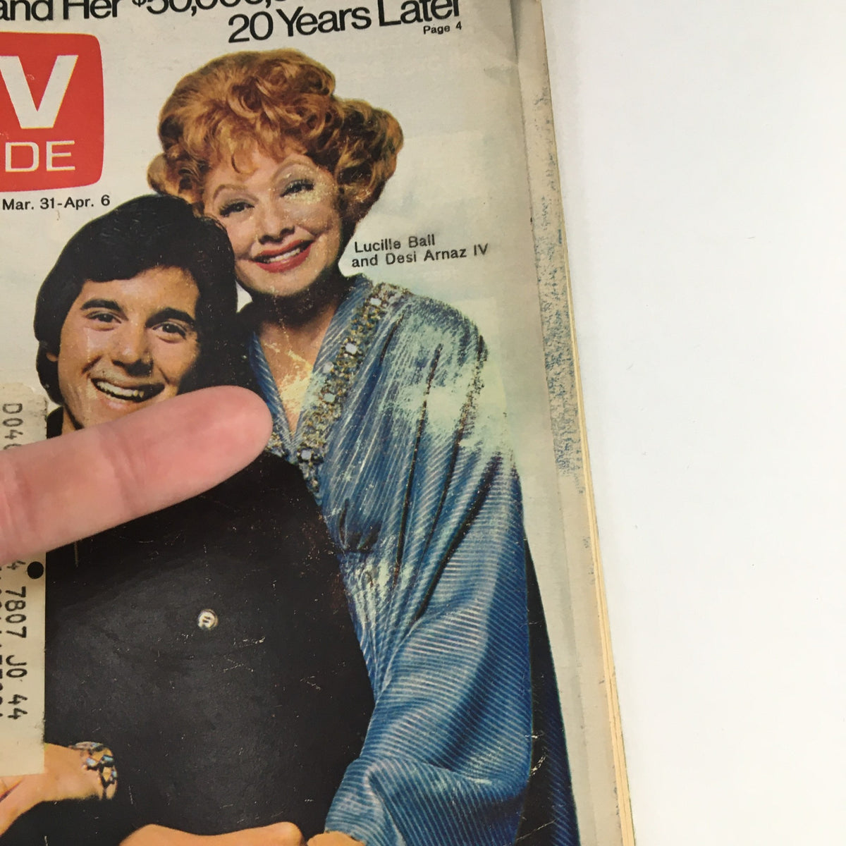 Close-up of the cover of TV Guide Magazine March 31, 1973, showing Lucille Ball and Desi Arnaz IV smiling for the camera.