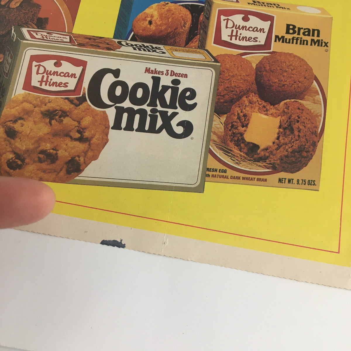 Close-up view of the 1983 Duncan Hines Cookie Mix box from the Sweepstakes Advertisement, showcasing the brand logo and product details.