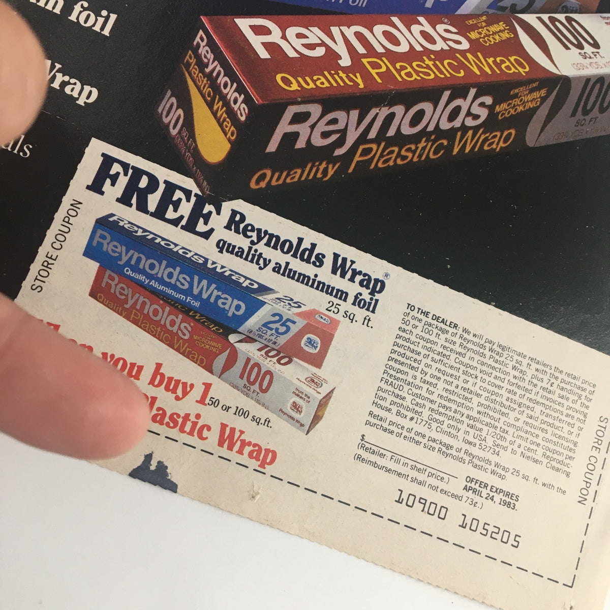 1983 Reynolds Wrap Aluminum Foil Circular Coupon Advertisement highlighting a store coupon for free Reynolds Wrap quality aluminum foil with the purchase of plastic wrap.