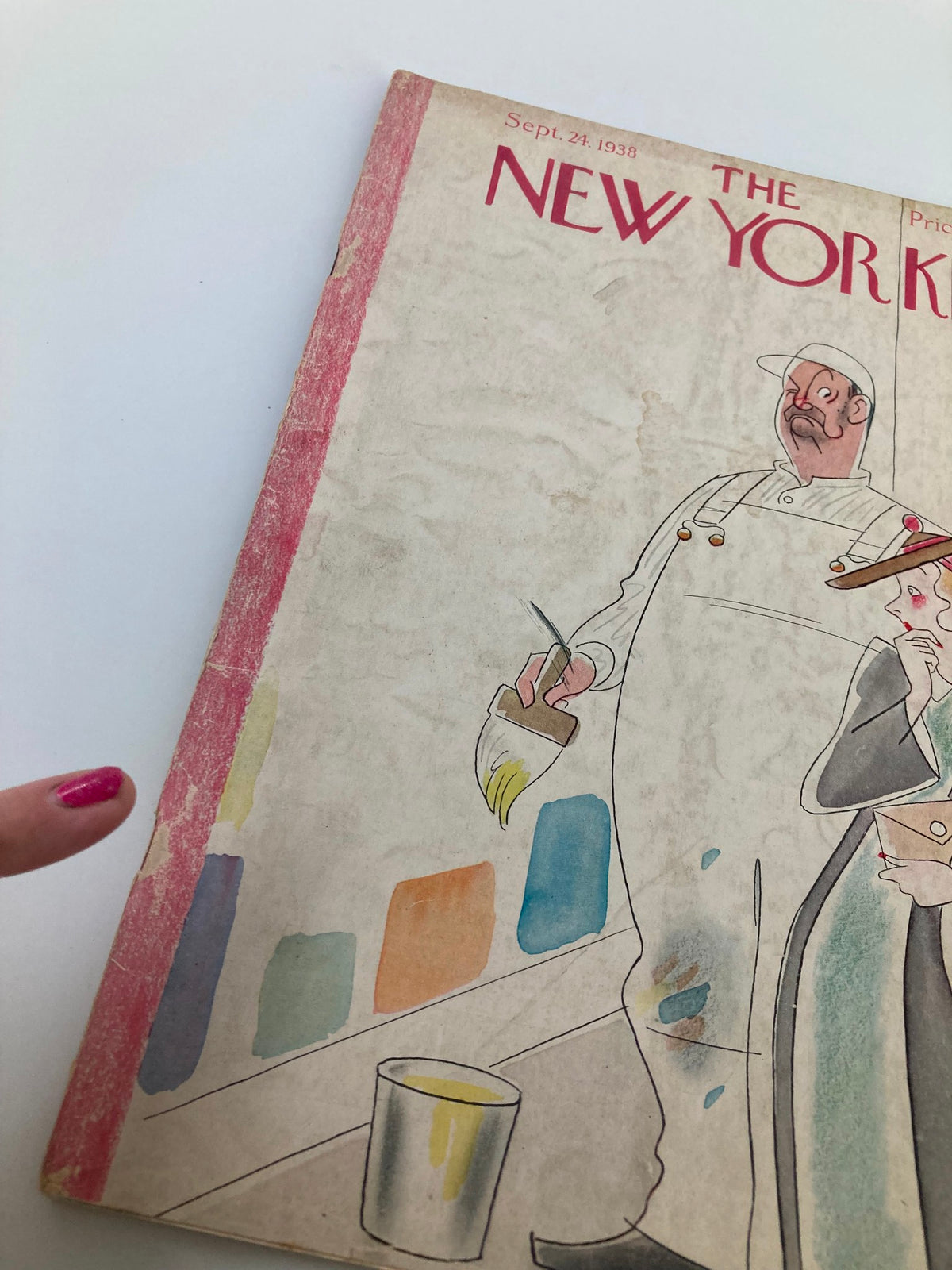 Cover detail of The New Yorker Magazine September 24 1938, featuring a woman choosing paint with a painter beside her, capturing a moment from the late 1930s.