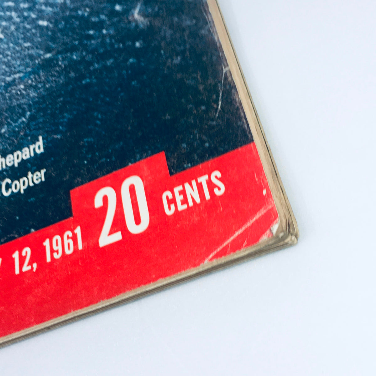 Close-up of the vintage Life Magazine from May 12, 1961, showing the price of 20 cents and the publication date. The cover features the title 'AOK! The U.S. Is In Space' and references to Al Shepard.