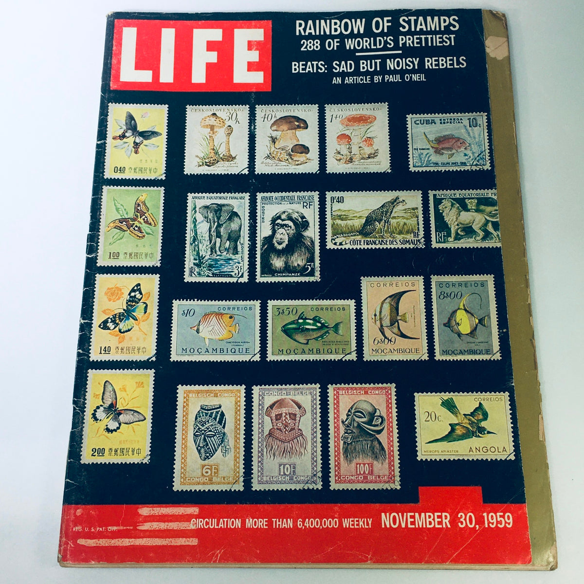 Cover of VTG Life Magazine from November 30, 1959, featuring a colorful array of 288 world stamps. The headline reads 'Rainbow of Stamps' alongside the cover story 'Sad But Noisy Rebels'.