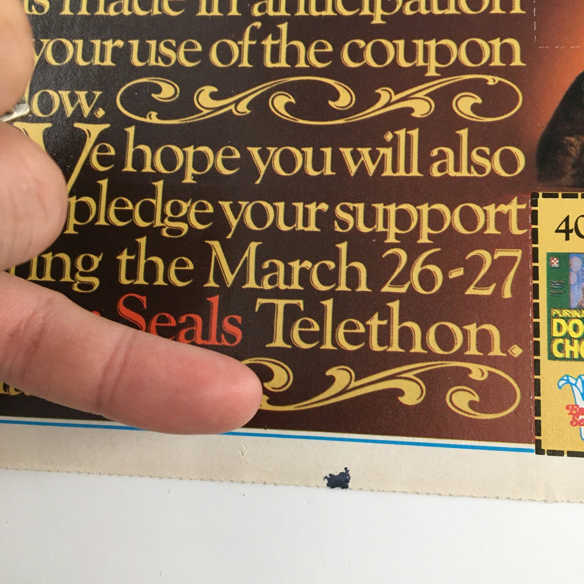 Close-up of the 1983 Purina Dog Chow Dog Food Circular Coupon Advertisement emphasizing the March 26-27 Easter Seals Telethon support.