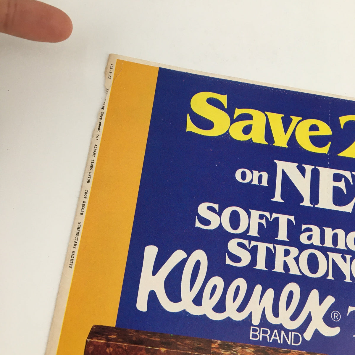 Close-up view of 1983 Kleenex Brand Tissues Circular Coupon Advertisement highlighting a promotional offer to save 20 cents on Kleenex products.