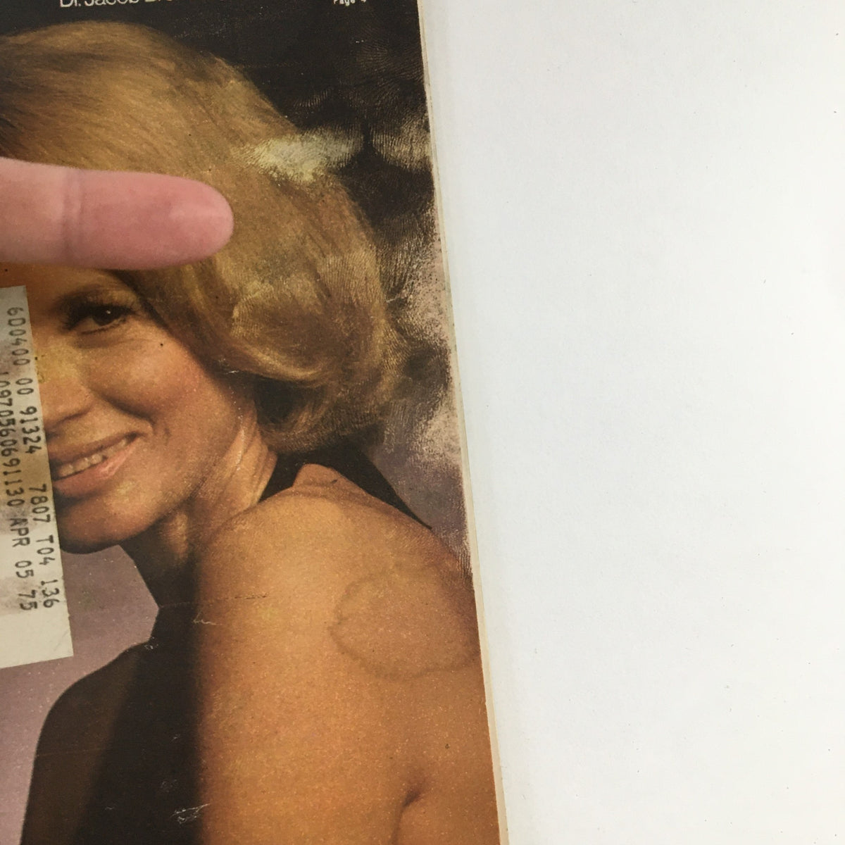 Close-up of TV Guide Magazine January 4 1975 cover showing Angie Dickinson smiling. Vintage television collectible image.
