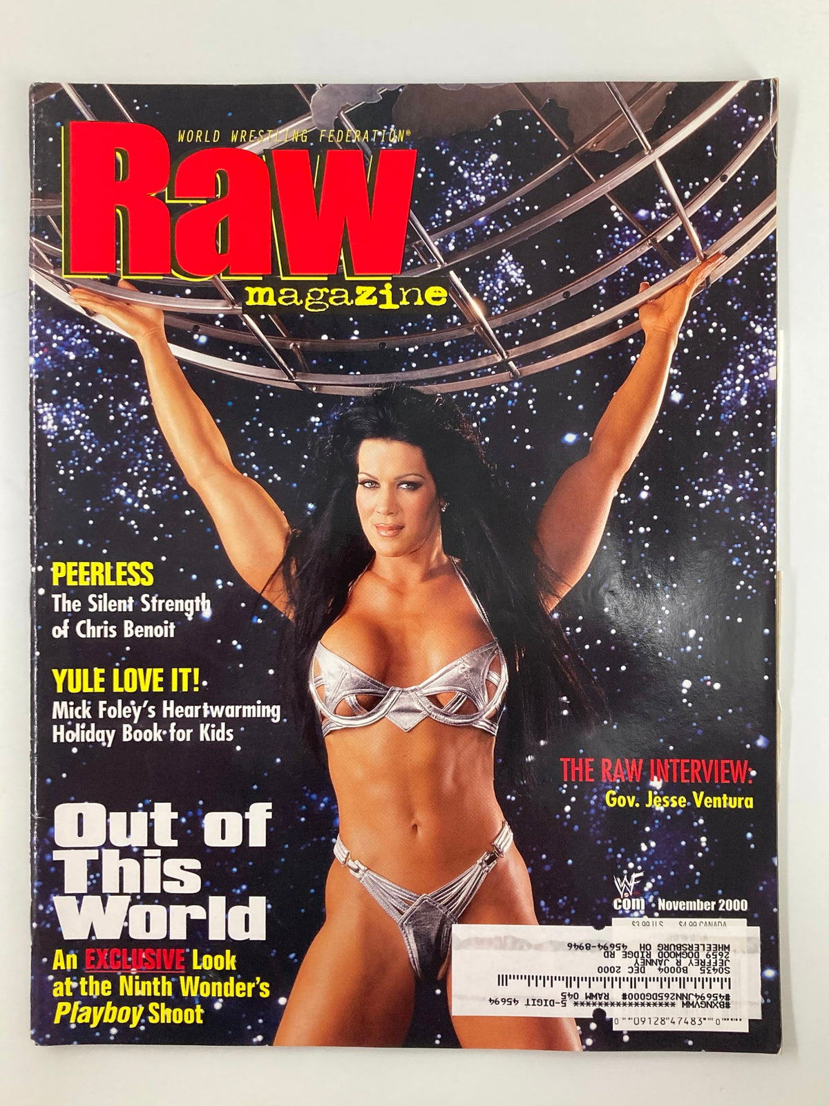 Cover of WWF Raw Magazine November 2000 featuring Chyna's Amazing Playboy Photo Shoot. The cover showcases Chyna in a striking silver bikini, posing dramatically under a starry backdrop.