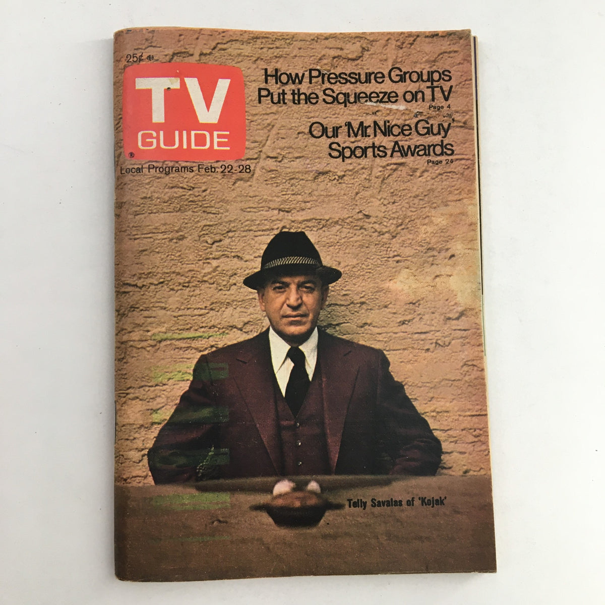 Cover of TV Guide Magazine February 22 1975 featuring Telly Savalas known for 'Kojak', highlighting key TV programs and articles.