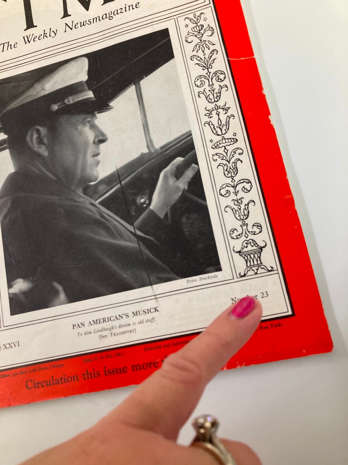 Cover of the VTG Time Magazine December 2, 1935, Vol 26 #23 featuring Pan American's Edwin Charles Musick. The image shows a profile view of a man in a cap, likely a pilot, with intricate detailing surrounding the magazine's title.