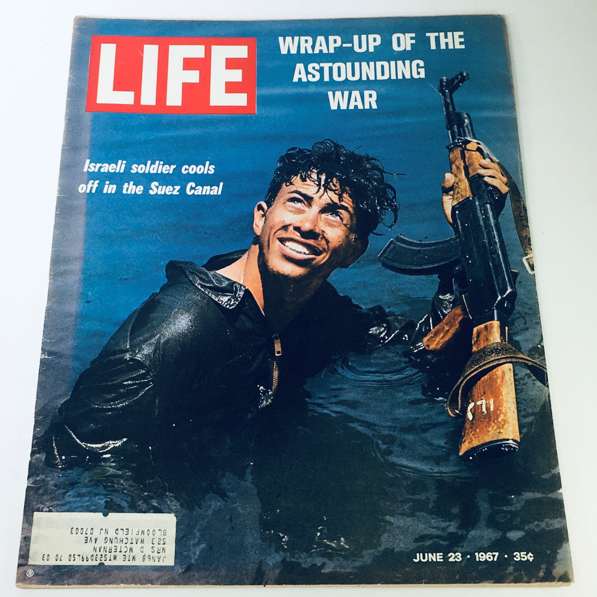 Cover of VTG Life Magazine June 23 1967 featuring a soldier cooling off in the Suez Canal, highlighting the wrap-up of the astounding war.