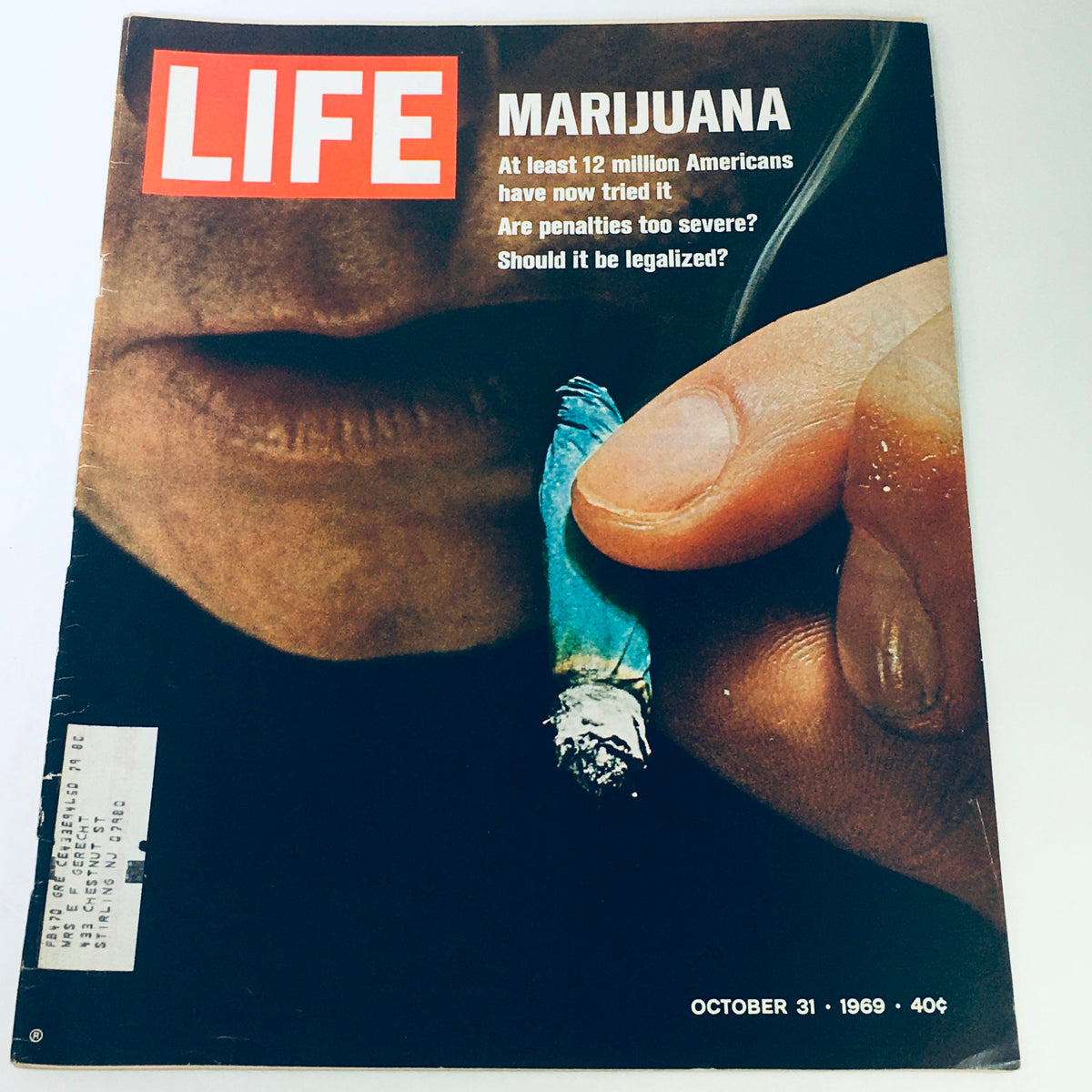 Cover of Life Magazine from October 31, 1969, featuring a bold headline 'Life Marijuana: At least 12 million Americans have now tried it.' The image showcases someone holding a rolled cigarette, symbolizing the cultural discussion on marijuana use during a transformative era in American society.