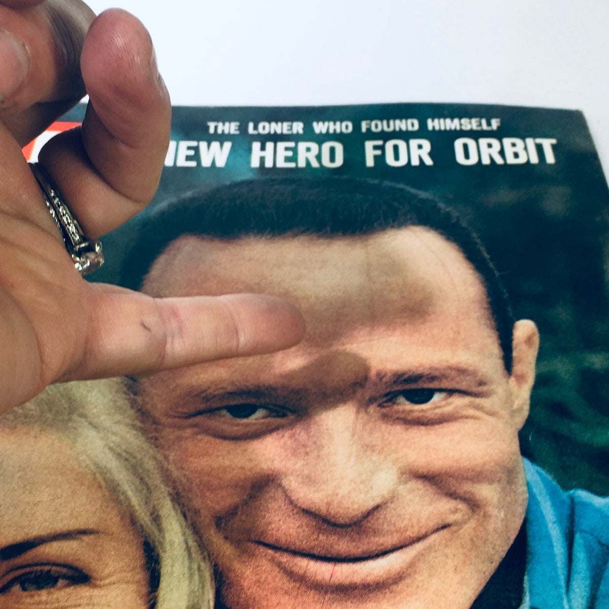 Close-up view of the cover of VTG Life Magazine May 18 1962, highlighting the face of astronaut Scott Carpenter as he poses with his wife Rene, with the magazine title prominently displayed.