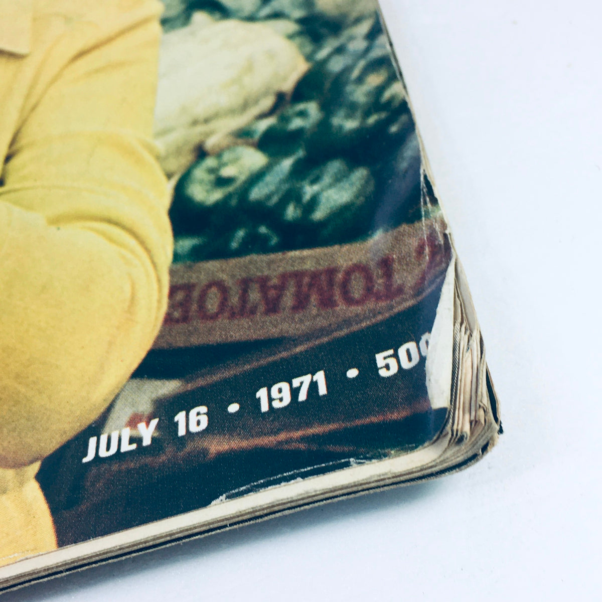 Close-up of the spine of the VTG Life Magazine July 16 1971, displaying the date and minor wear, emphasizing its vintage condition.