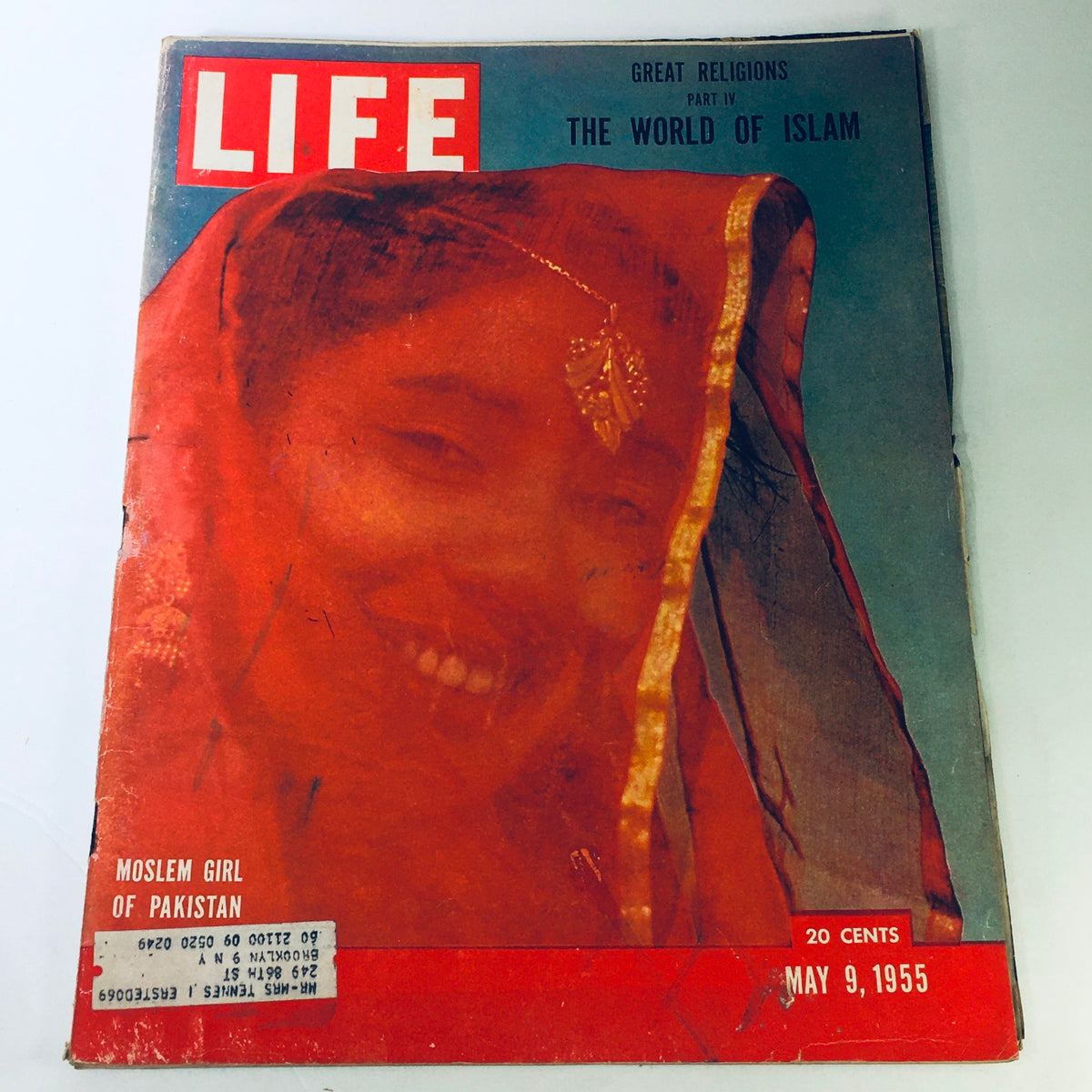 Cover of 'VTG Life Magazine May 9 1955 - The World of Islam / Moslem Girl of Pakistan', featuring a smiling Moslem girl from Pakistan, showcasing cultural attire and vibrant colors.
