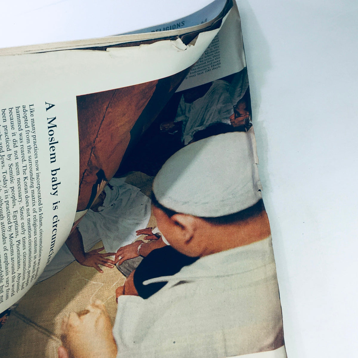 Inside page of 'VTG Life Magazine May 9 1955 - The World of Islam / Moslem Girl of Pakistan', displaying an article about Islamic practices, including a Moslem baby being circumcised, an insightful glimpse into the customs of the 1950s.