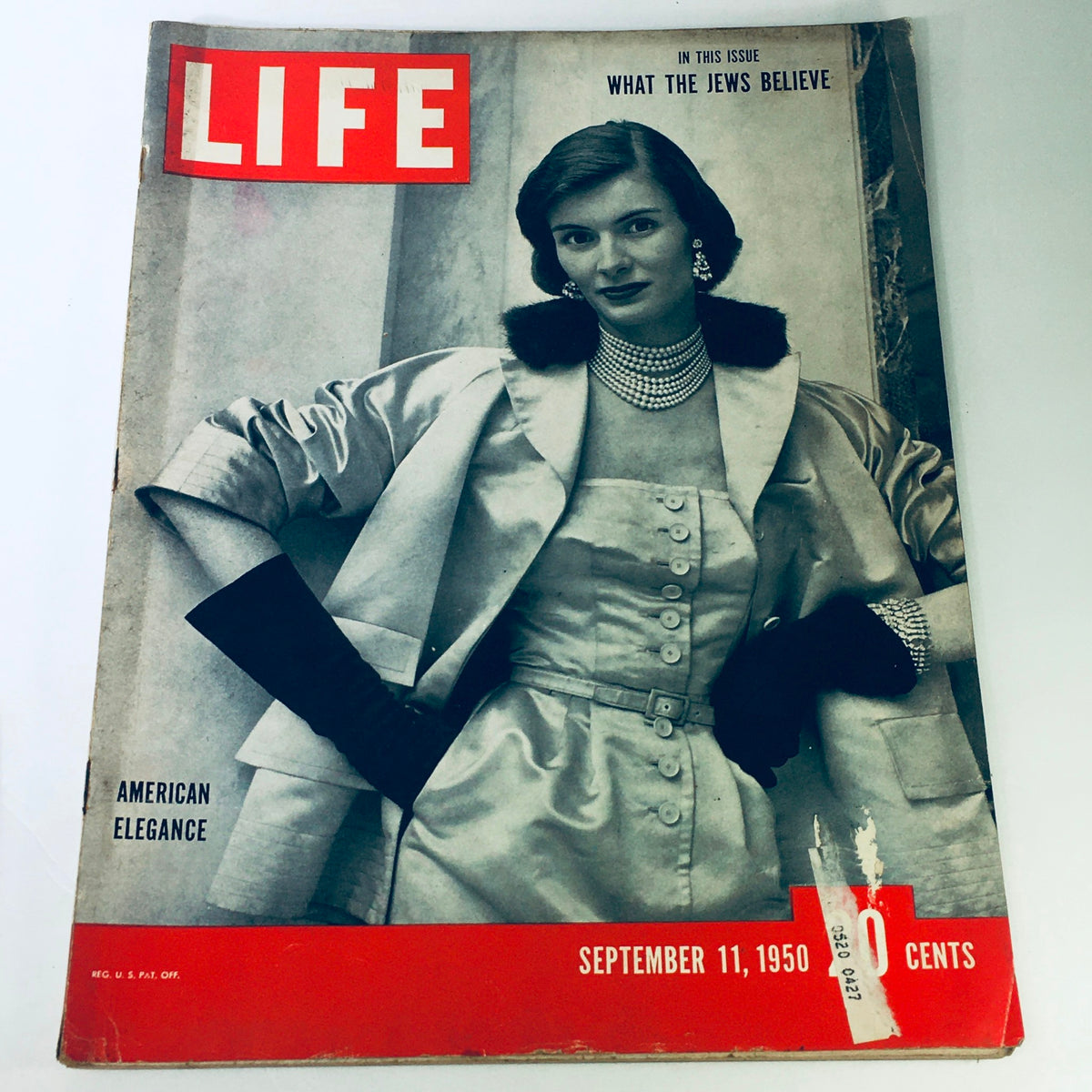 Cover of VTG Life Magazine September 11, 1950 featuring an elegant woman in a stylish outfit, showcasing themes of 'What The Jews Believe' and 'American Elegance'.