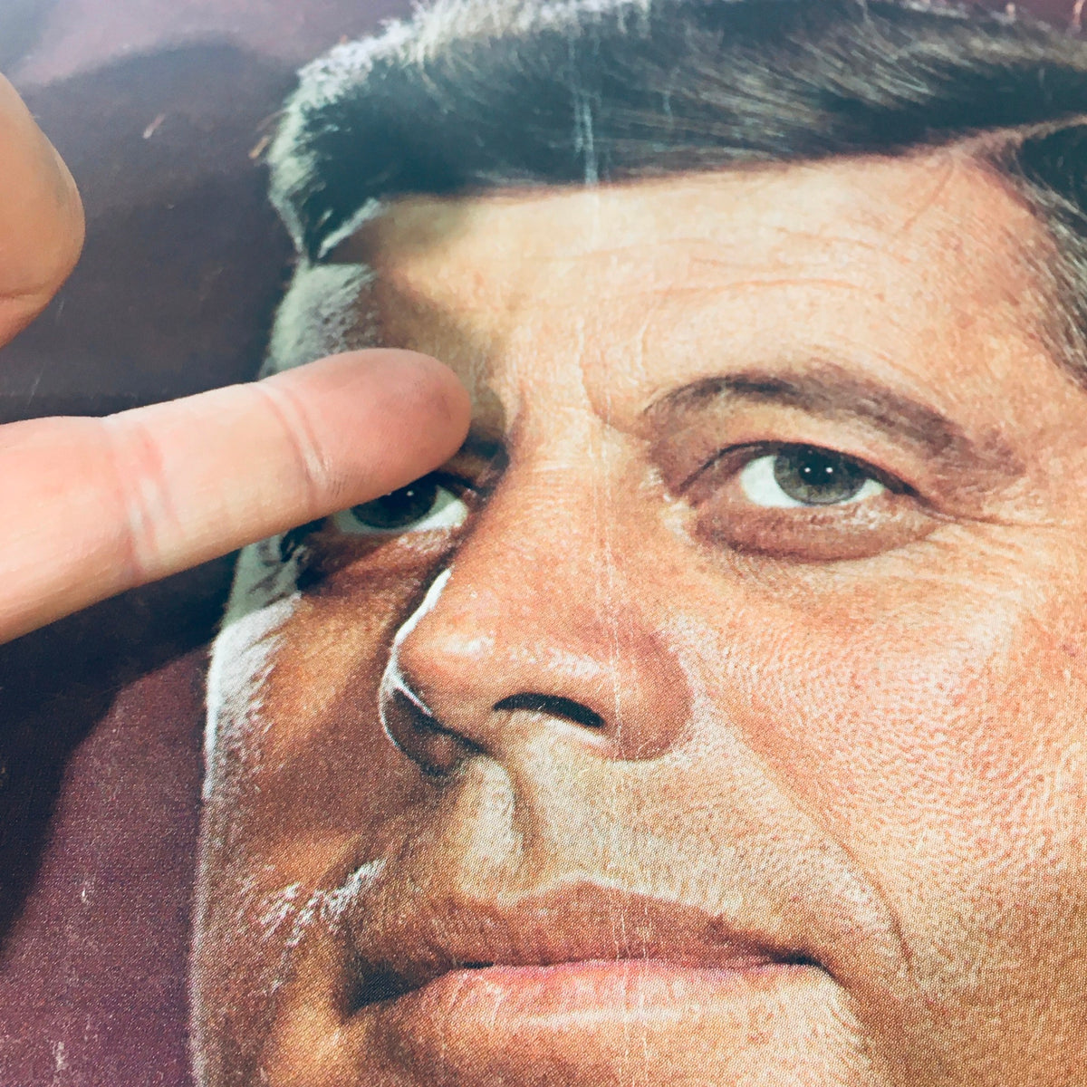 Detailed image of a prominent figure from the VTG The Saturday Evening Post August 14 1965, with a focus on facial features, reflecting the era's style.