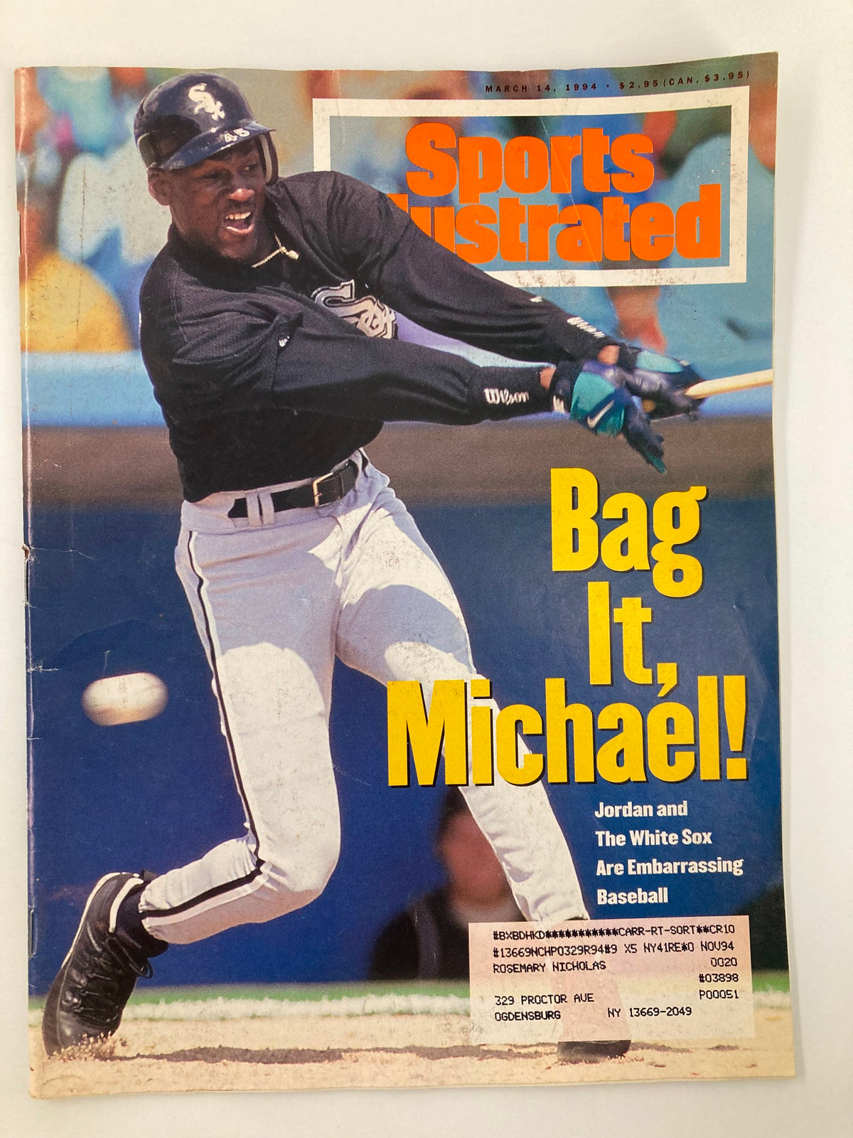 Cover of Sports Illustrated Magazine dated March 14, 1994, featuring Michael Jordan in a Chicago White Sox uniform, highlighting the title 'Bag It, Michael!' with a focus on his transition from basketball to baseball.